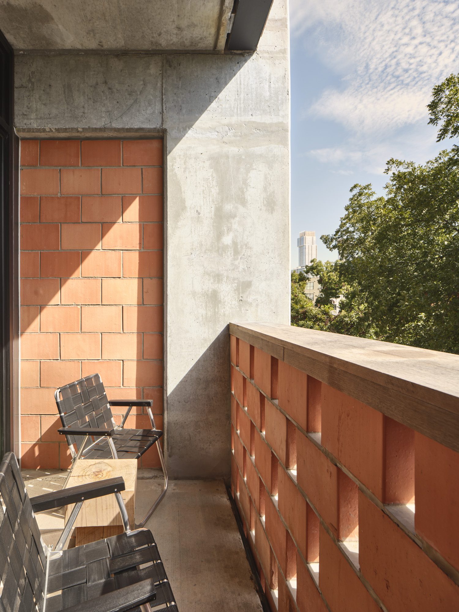 Seating area with two folding chairs on the Standard Double suite patio