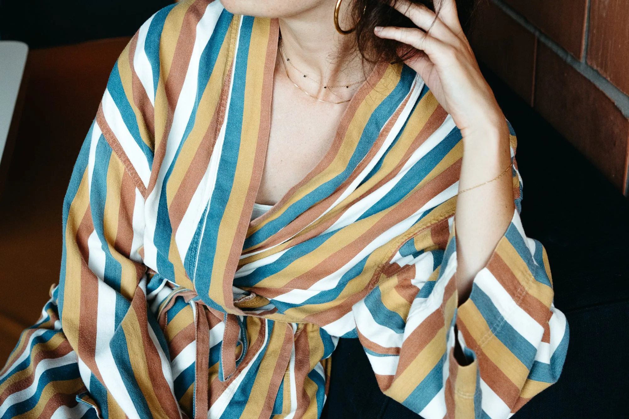 A guest in a striped robe