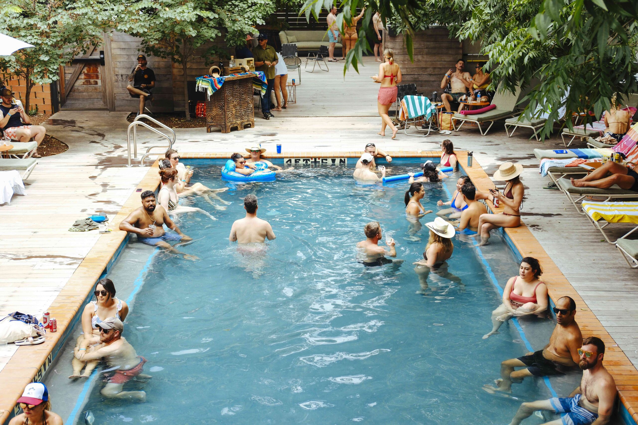 guests in pool at carpenter hotel