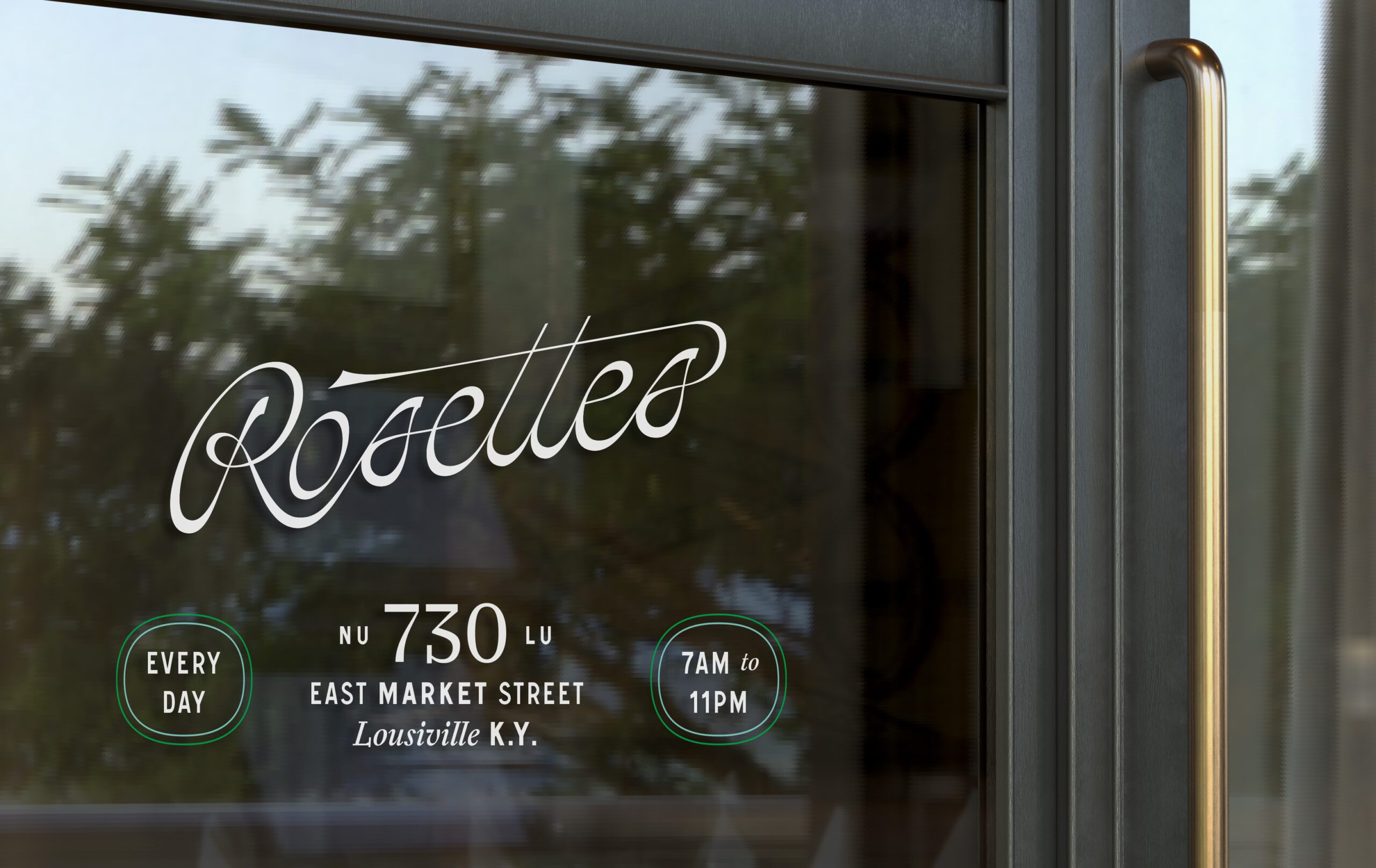 Rosettes logo on a glass door with gold handle