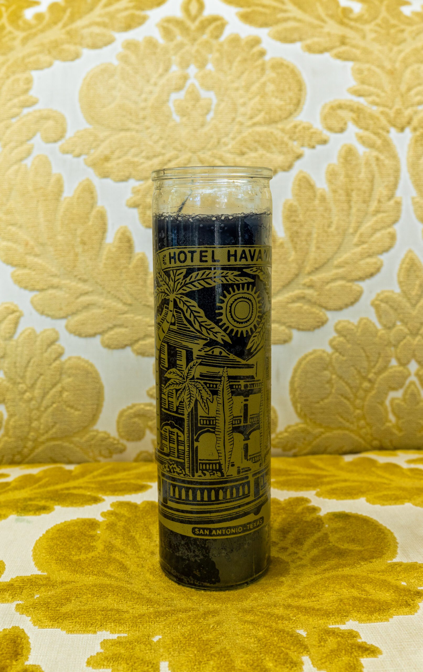 Hotel Havana branded prayer-style candle