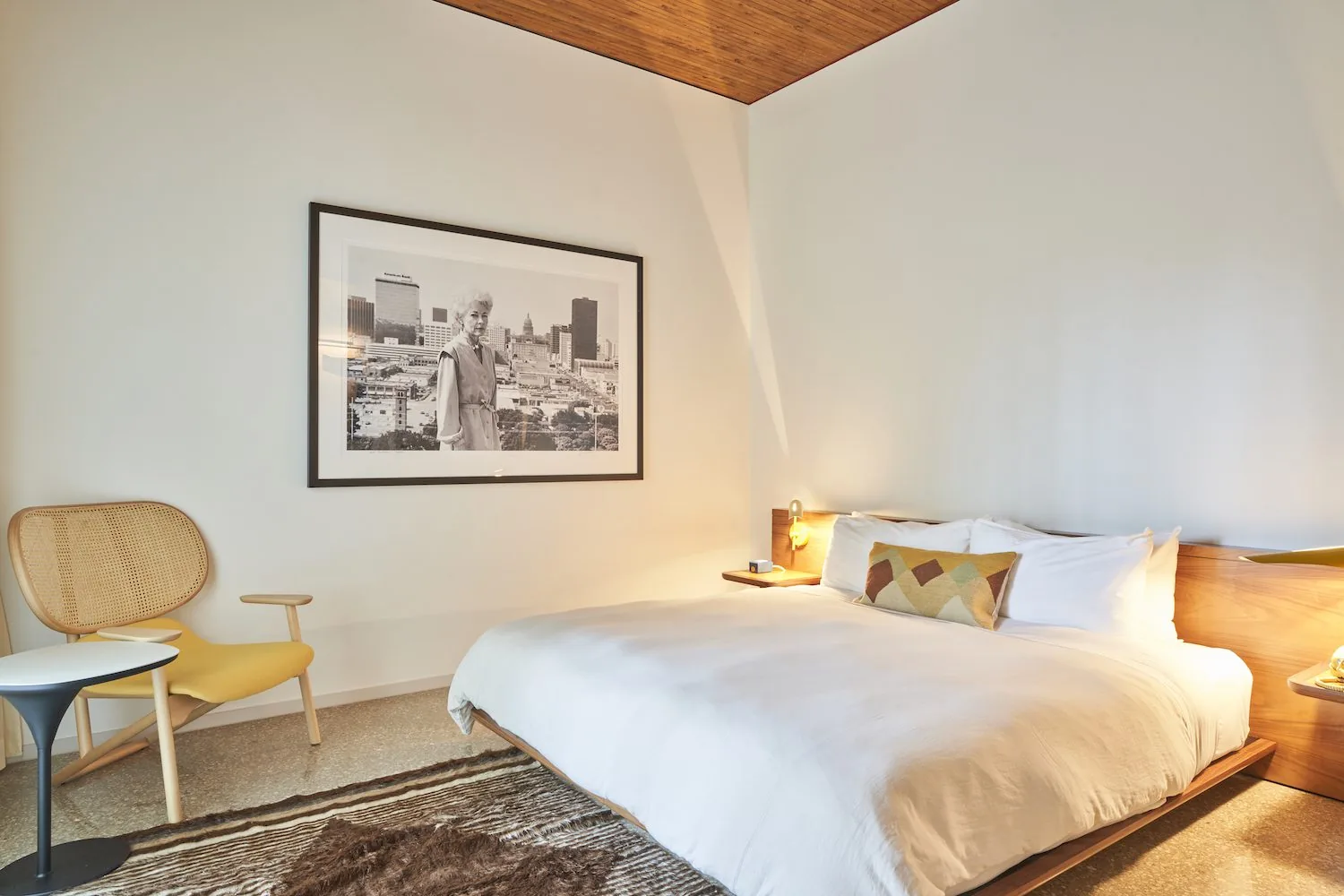 a king bed in an ADA Spring Suite