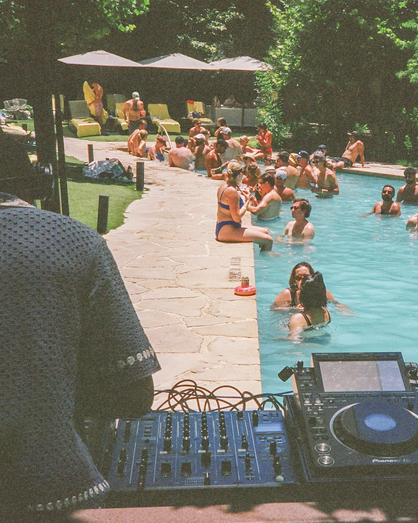 DJ playing poolside