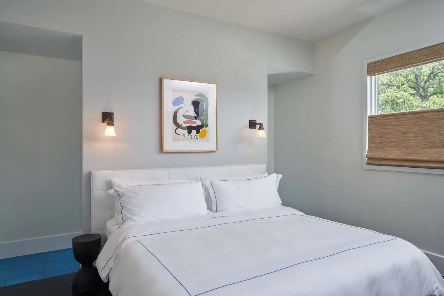 A bed in the Studio Suite