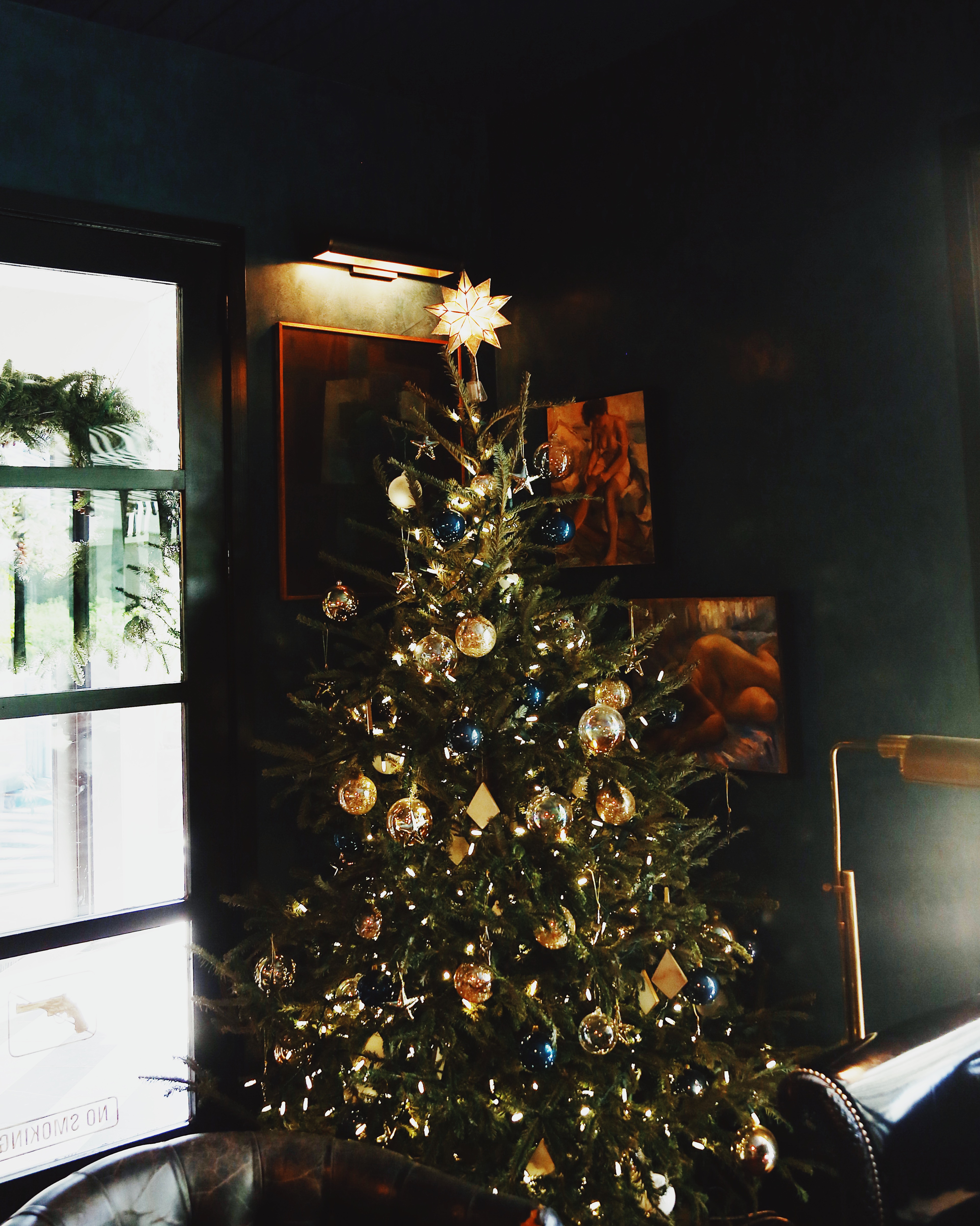 Decorated, lit up Christmas tree in the Lounge at Hotel Saint Cecilia