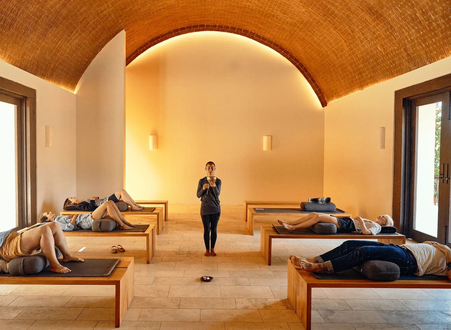 A soundbath class inside the chapel