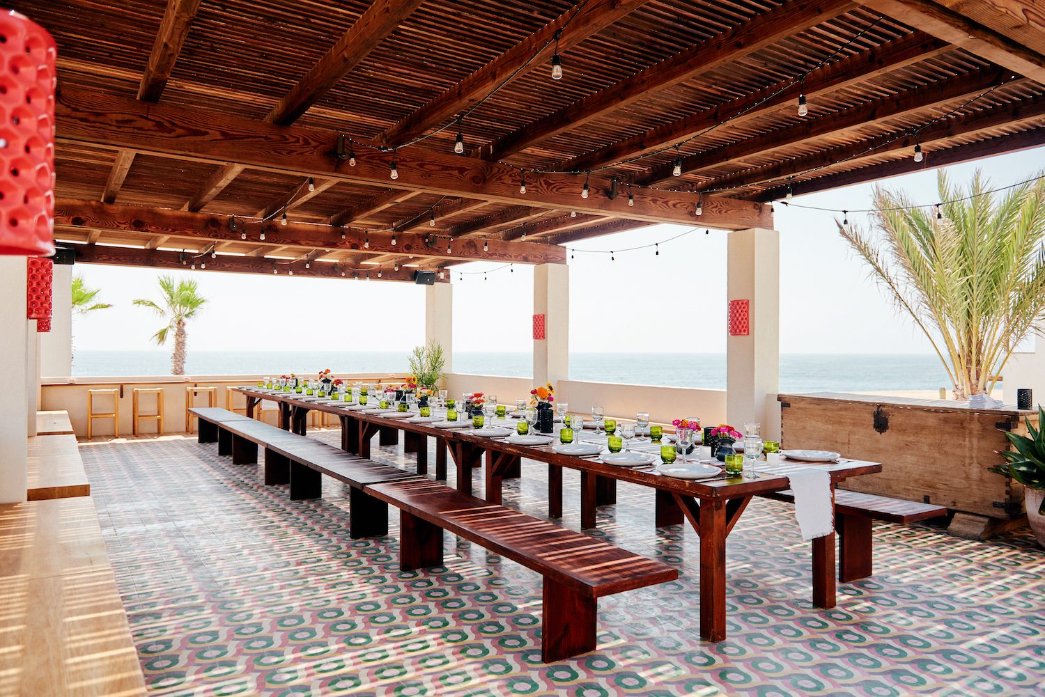 A dinner event in a roofed courtyard
