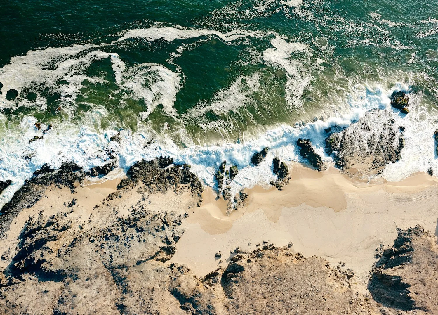 beach and rocks overhead