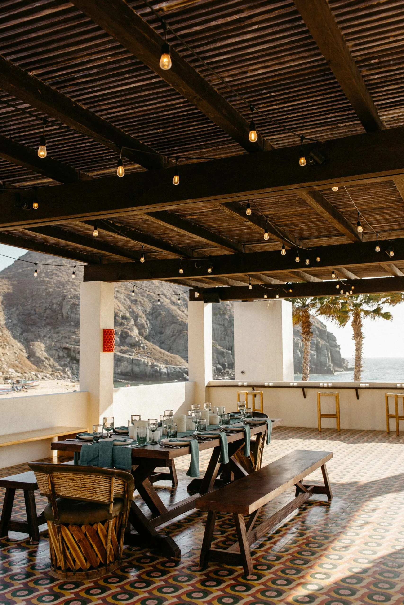Outdoor dining area with sea view