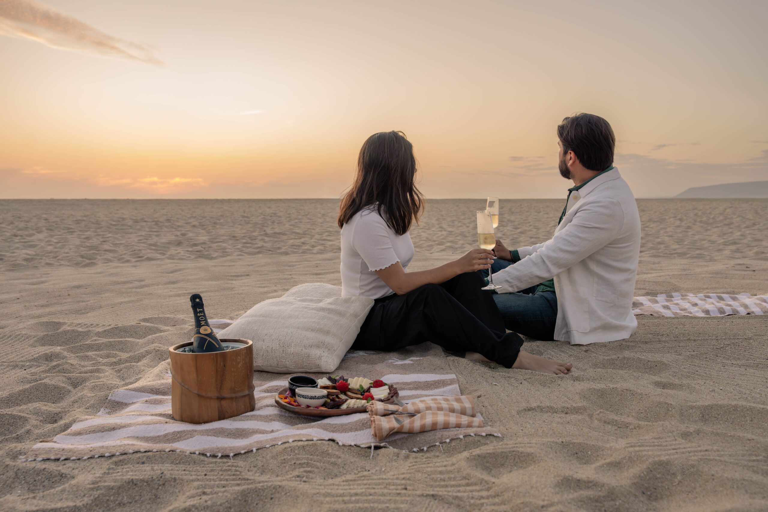 romantic picnic on the beach at hotel san cristobal