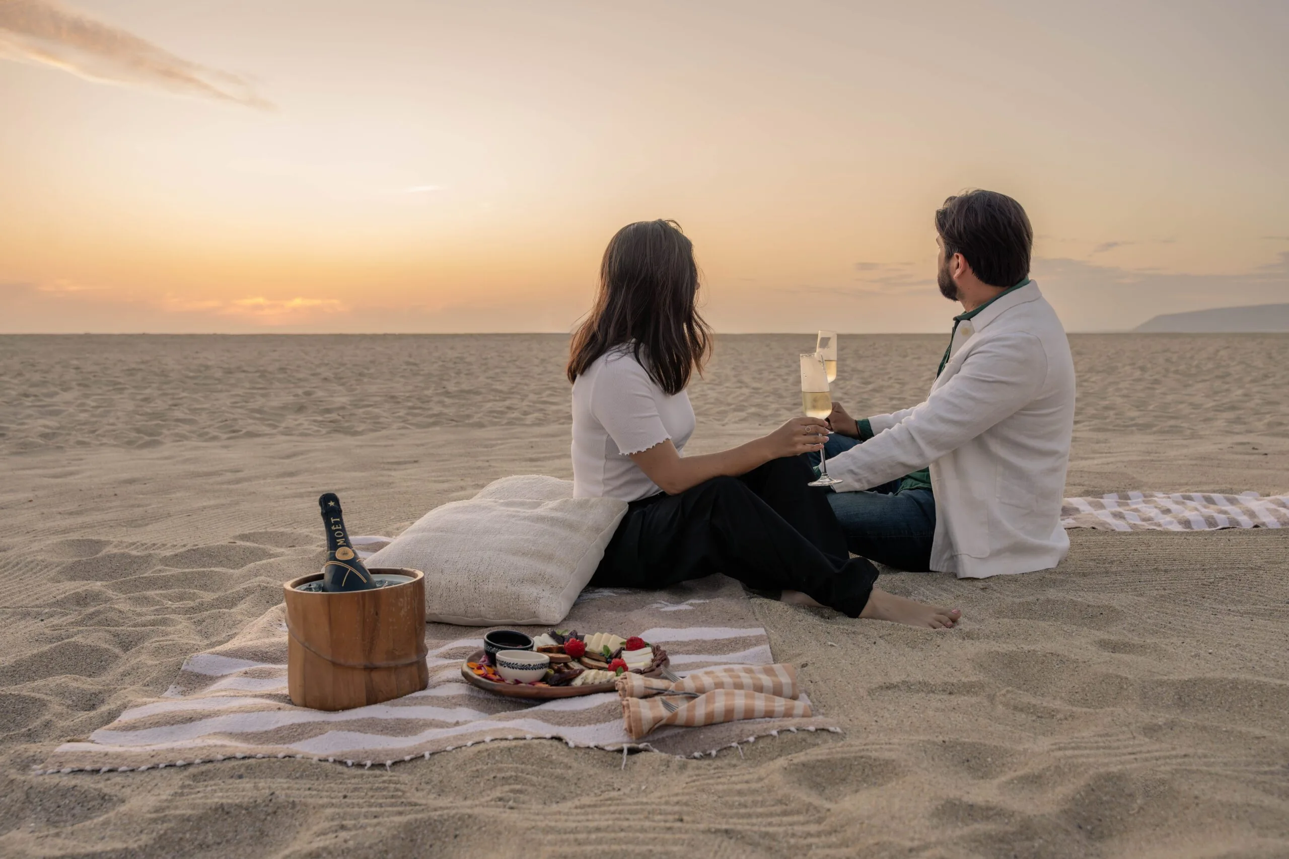 romantic picnic on the beach at hotel san cristobal