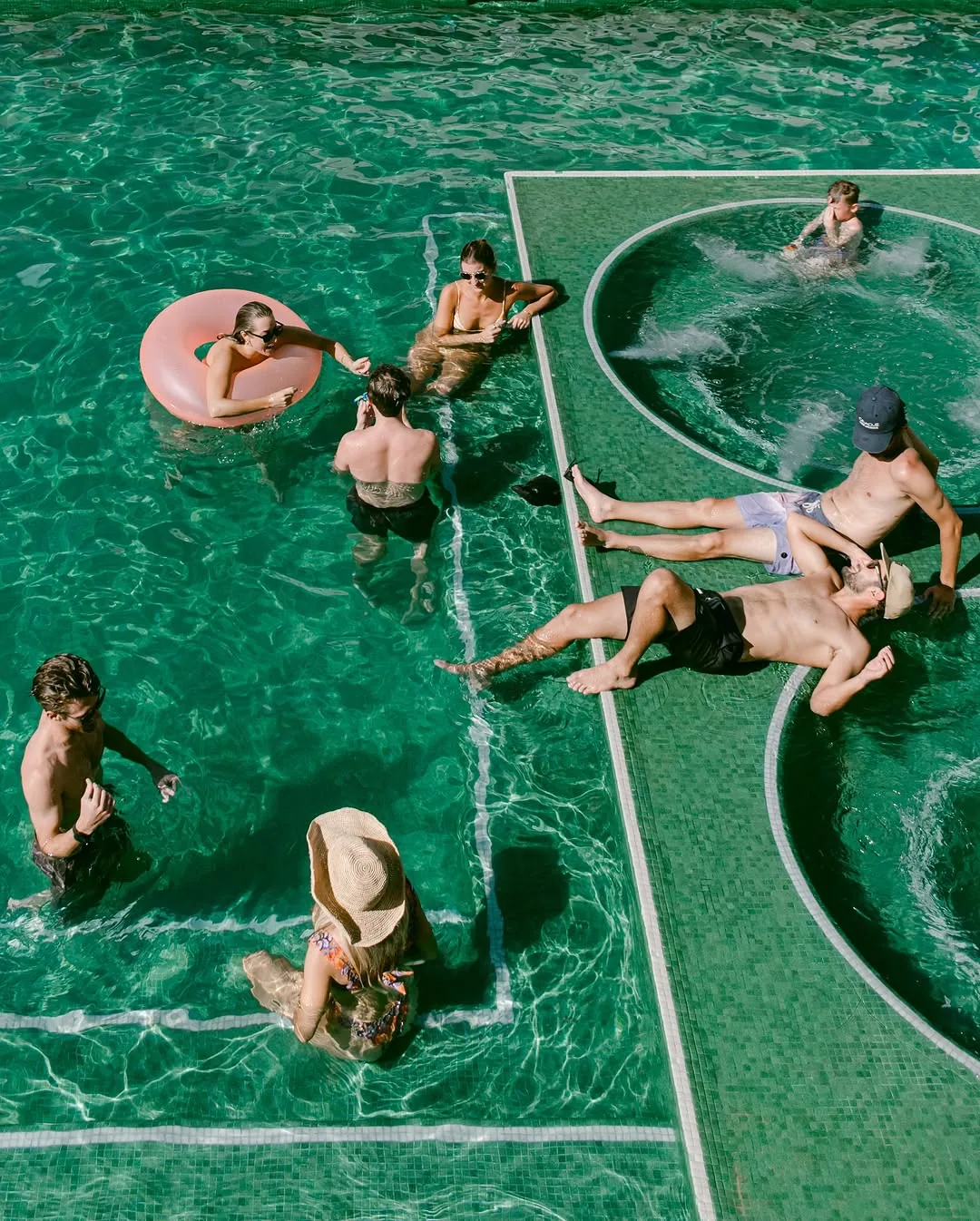 people hanging out in pool