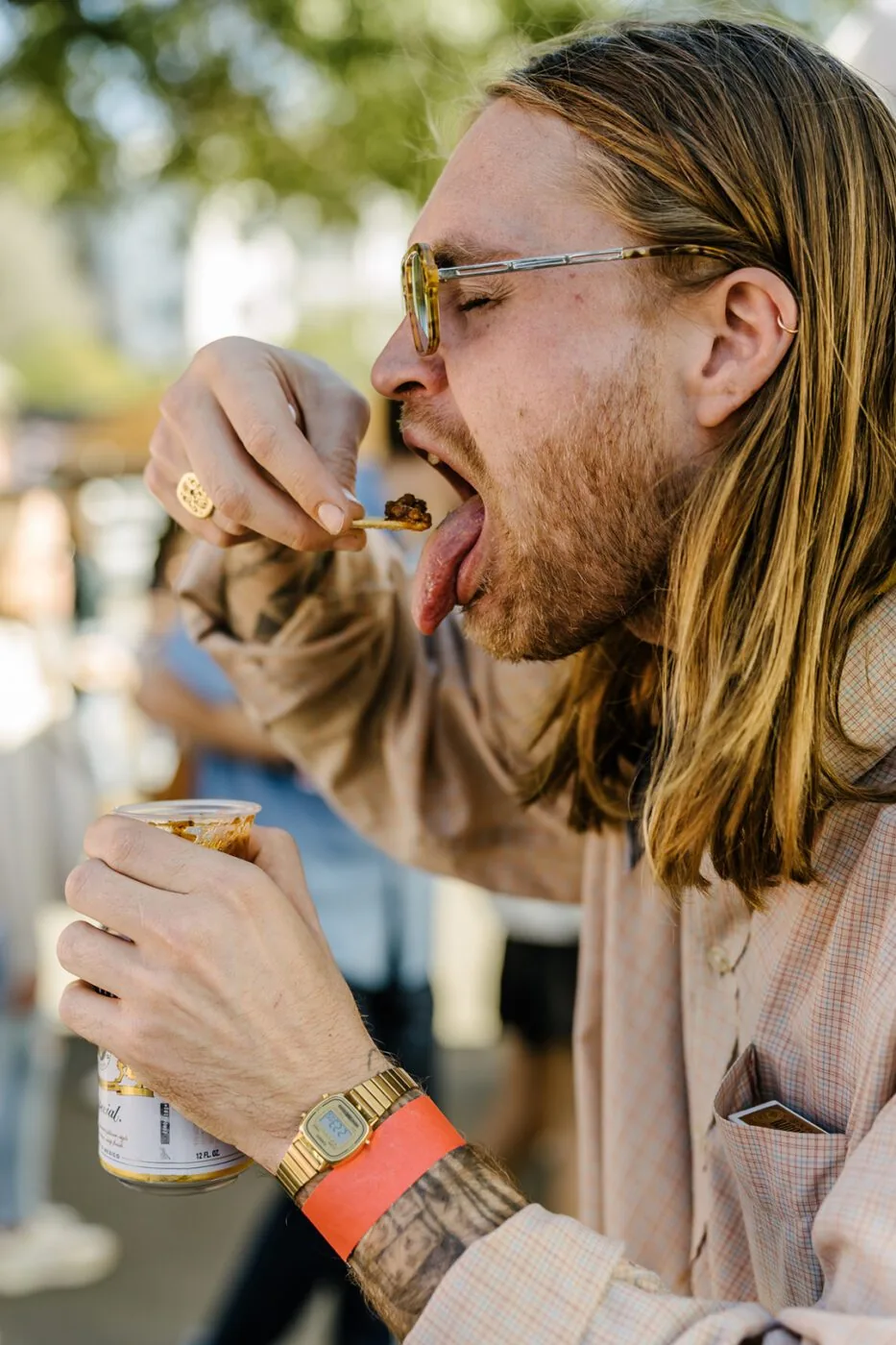A man eating chilli on a chip