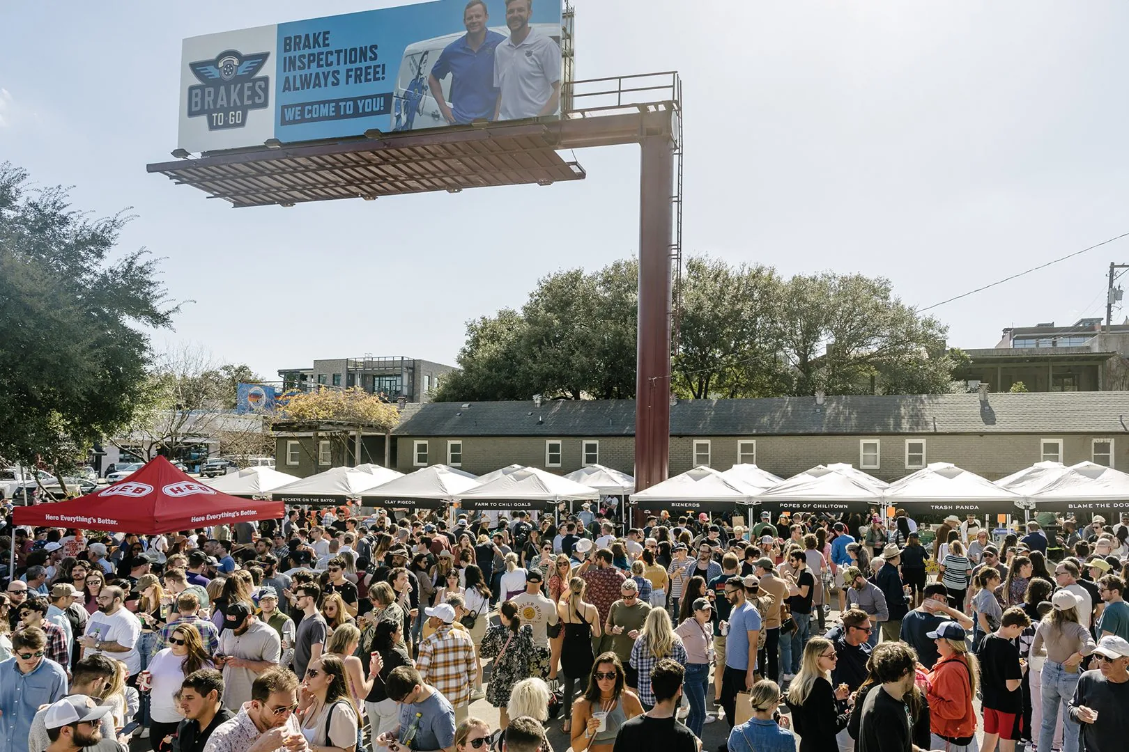 outdoor view of people at the the chili cook off event