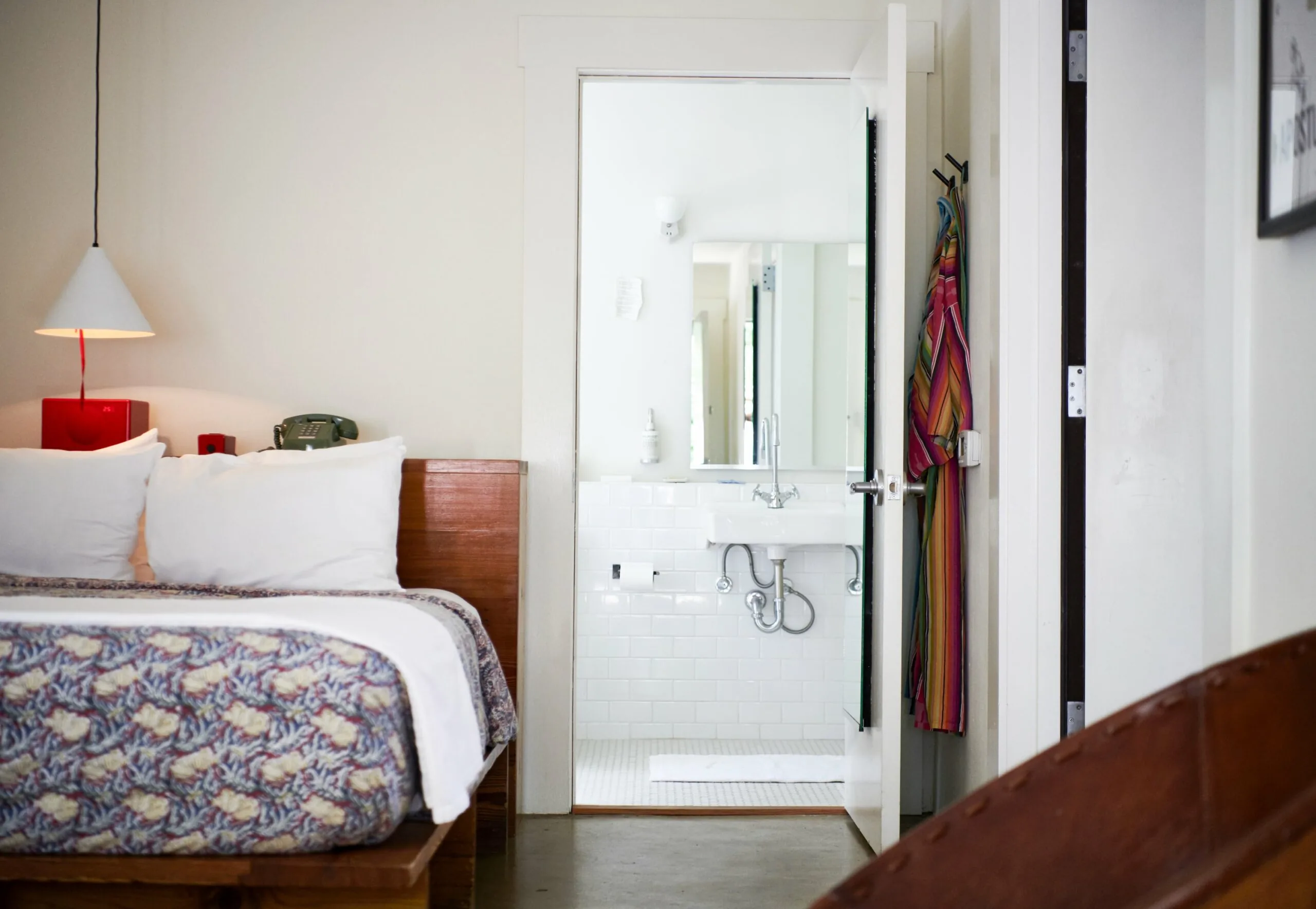 A view into the bathroom at Hotel San Jose; white tile