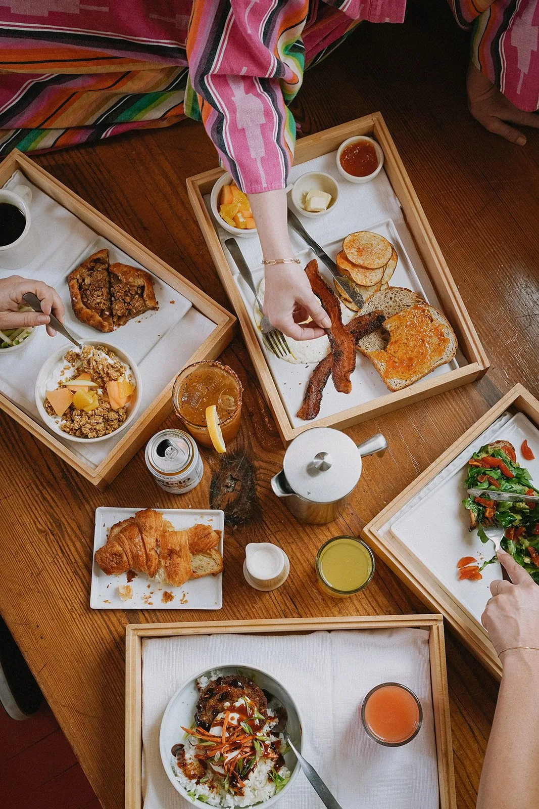 People eating breakfast in robes