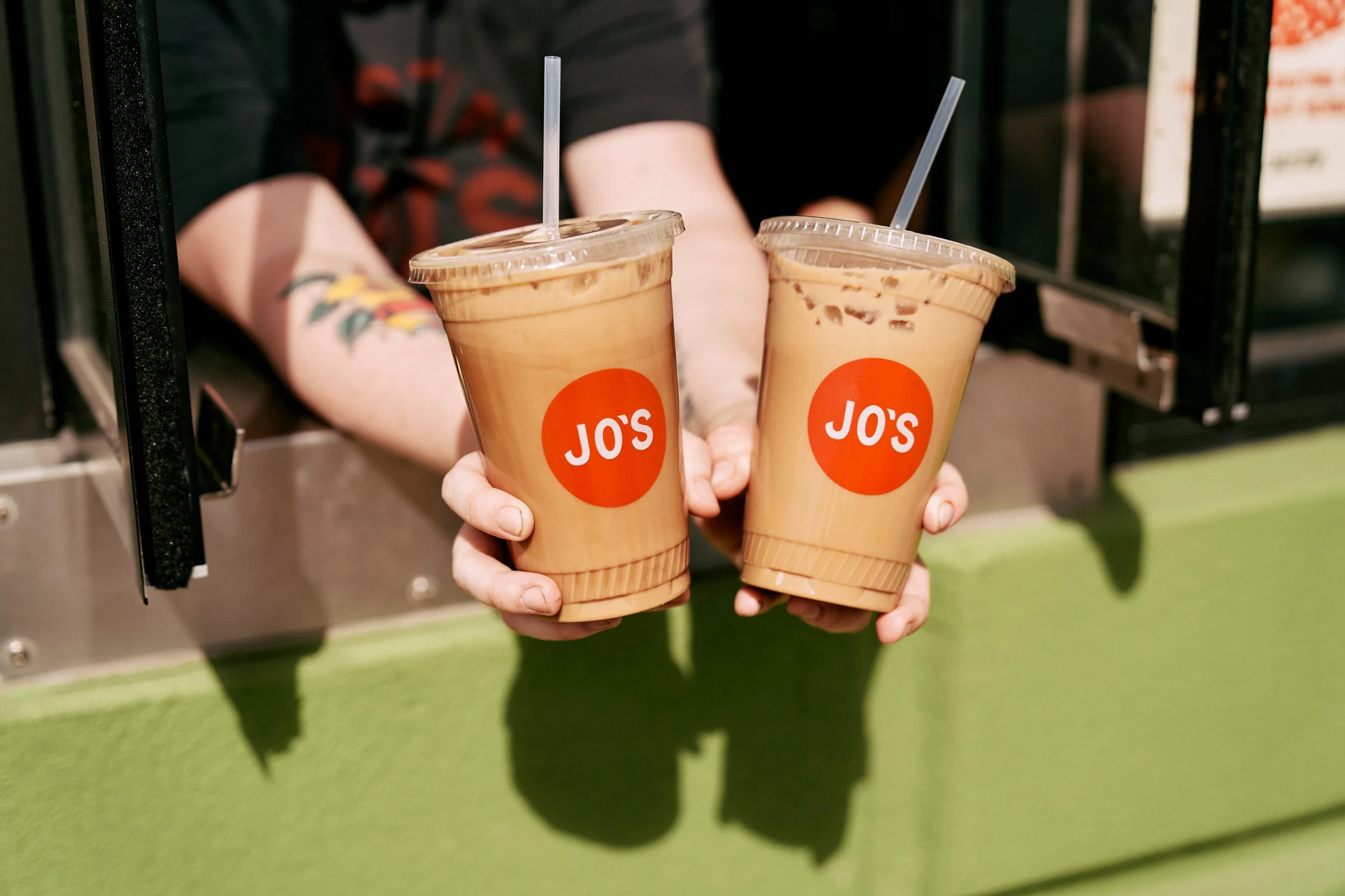 Two to-go cups from Jo's Coffee