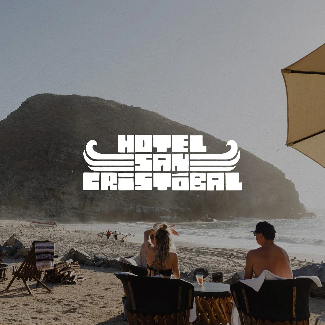 Hotel San Cristobal logo over image of people on the beach