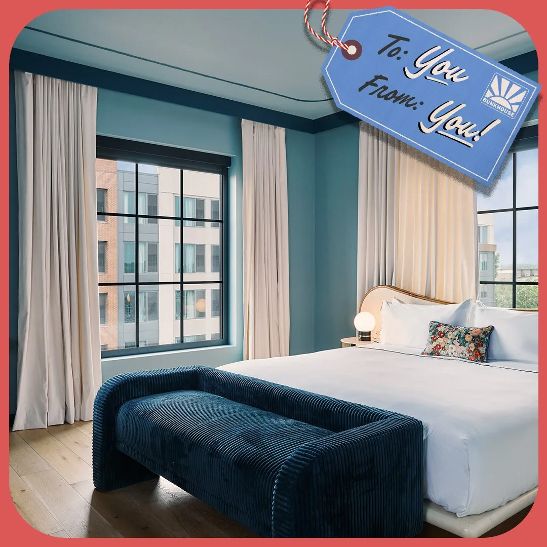 Picture of the Hotel Genevieve with the illustration of a gift tag that says to: you, from: you