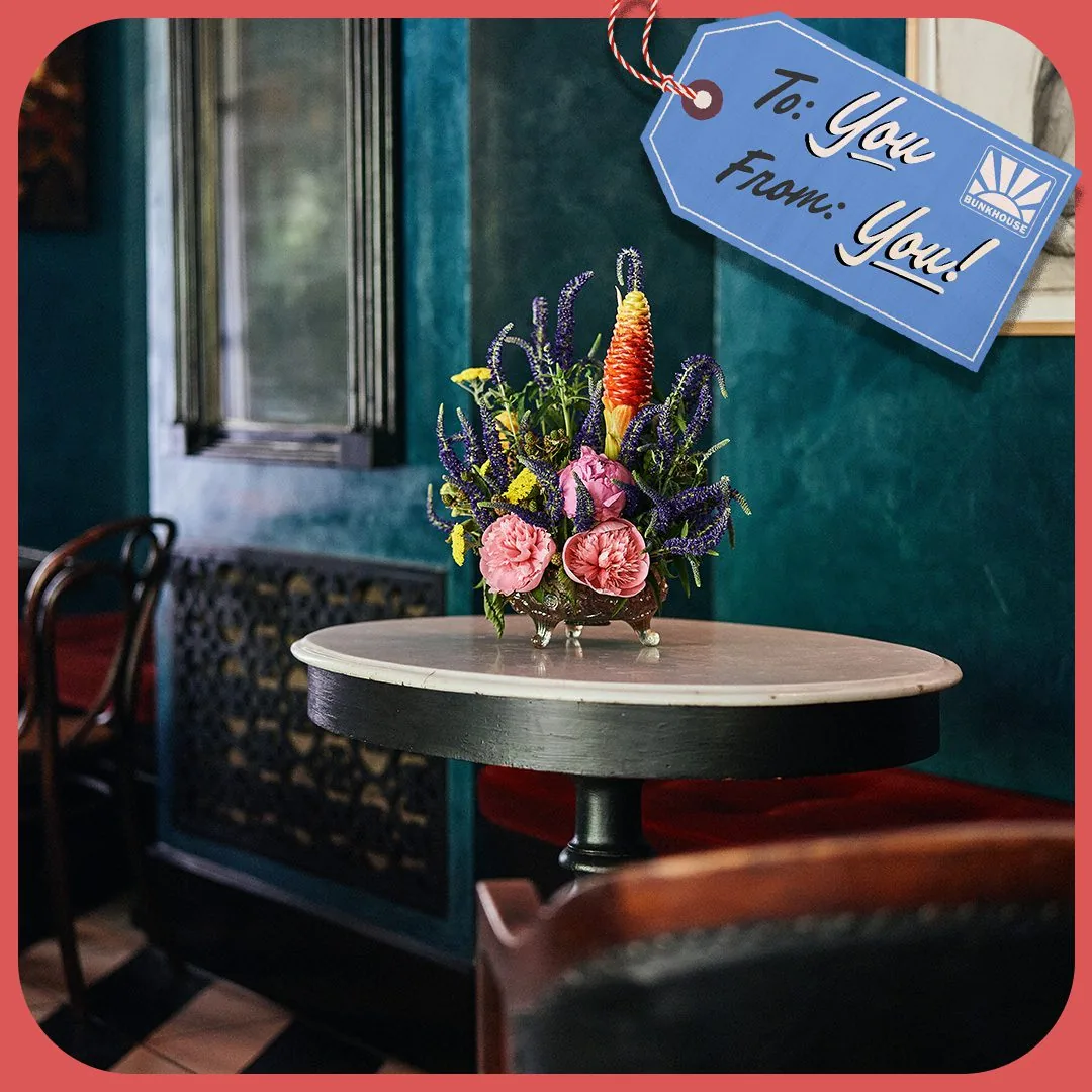 Picture of the Hotel Saint Cecilia with the illustration of a gift tag that says to: you, from: you