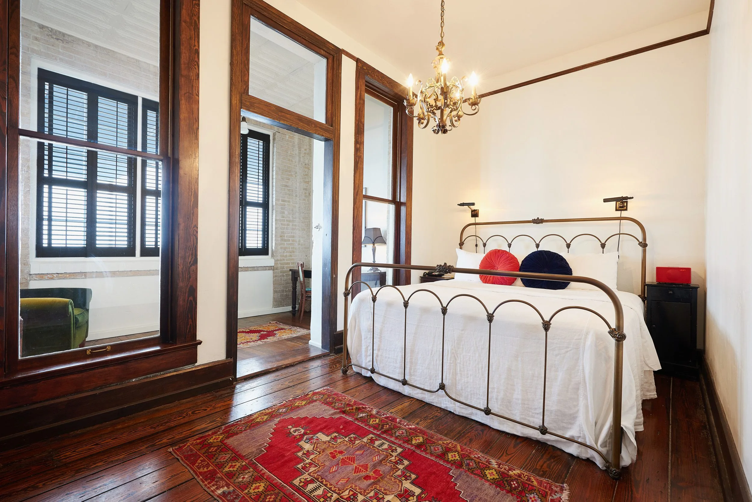 Grand Suite as Hotel Havana with iron bed and round velvet pillows