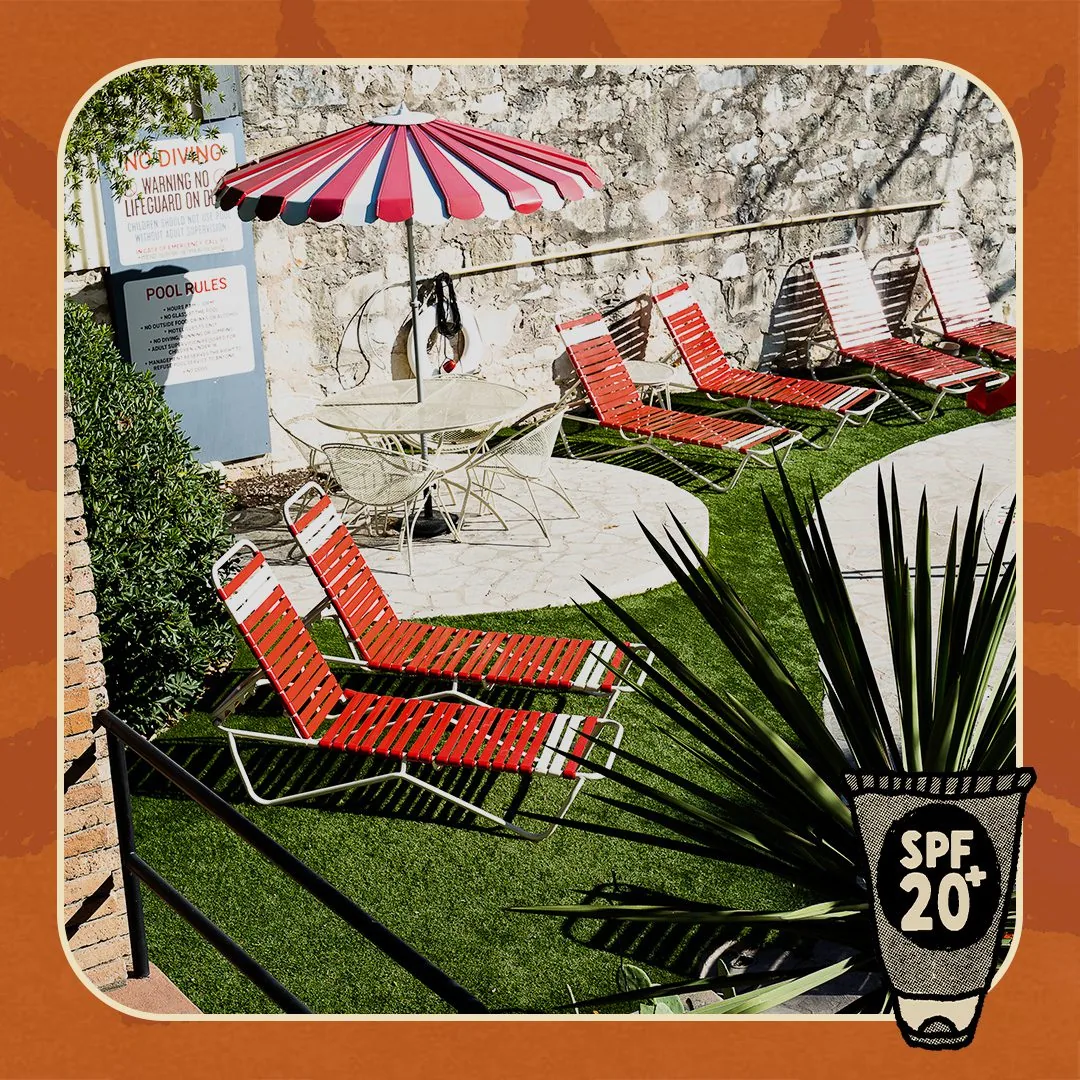 Loung chairs with a border and a suntan lotion bottle with SPF 20+