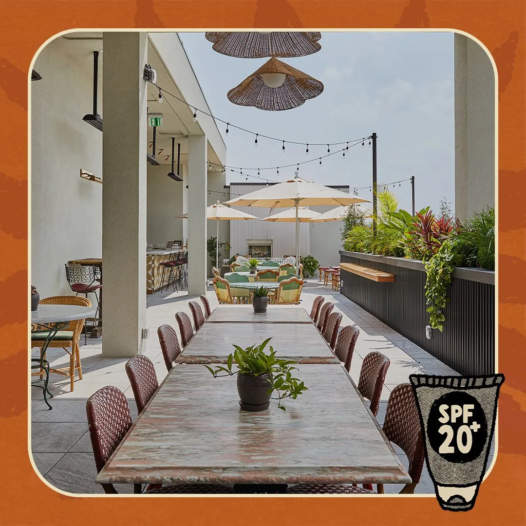 Picture of a roof deck with a border and a suntan lotion bottle with SPF 20+