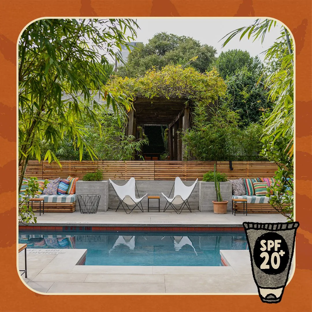 Lounge chairs with a border and a suntan lotion bottle with SPF 20+